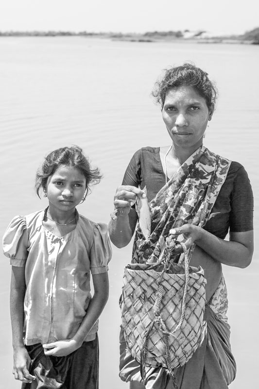 Women and Water Needs from Gender Perspective - A Yanadi woman with her fish catch from a local canal in Nellore district, Andhra Pradesh